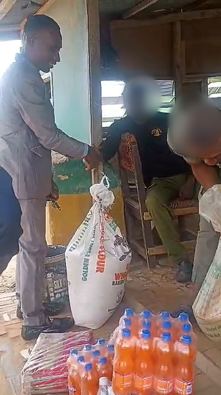 Handing over donated food items at the custodial centre